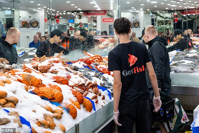 More than 100,000 people are expected to visit the Sydney Fish Market (above) over the next 36 hours