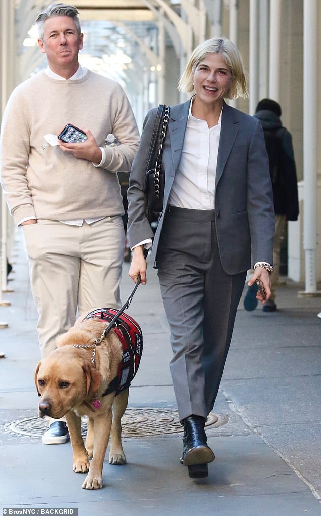 Selma Blair was in good spirits on Tuesday as she stepped out in New York City with a friend and her dog Scout