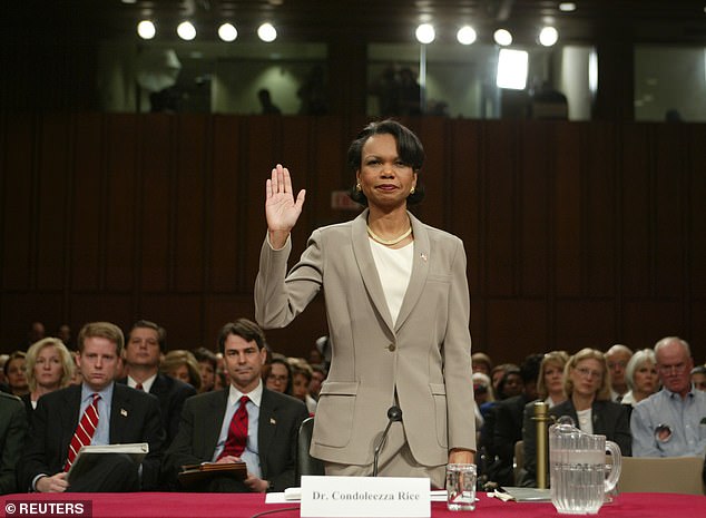 National Security Advisor Dr. Condoleezza Rice is sworn in to testify under oath before the 9-11 Commission in the Hart Senate Office Building on Capitol Hill in Washington, April 8, 2004