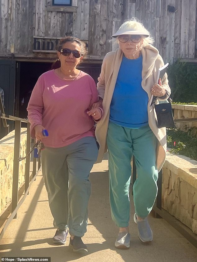 Shirley MacLaine, 89, was joined by her healthcare assistant during a lunch outing at Kristy's in Malibu this week