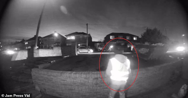 This is the shocking moment a Yodel delivery man is caught on camera urinating in a shocked couple's front garden