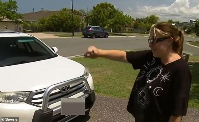 Megan Pass (pictured with her car) was fined $193 for parking in the city-owned portion of her driveway