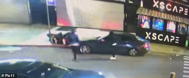 Security footage showed the shocking moment a 28-year-old woman and mother of a four-year-old was ambushed and shot dead by three gunmen in Queens on Tuesday evening.