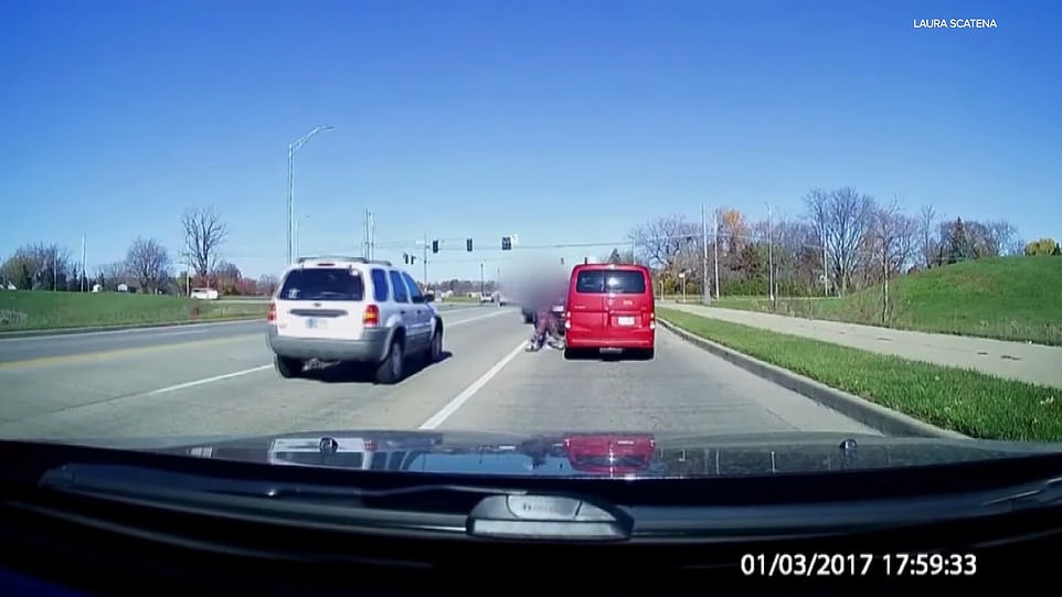 Seconds later, Mozee has swung his car in front of Henkle's, jumped out and walked to Henkle's car, where he throws a punch at the passenger window, shattering the glass and hitting his target in the head with the same blow.