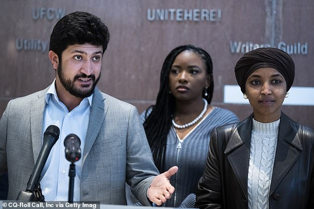 Congressman Greg Casar (left), who has ties to 