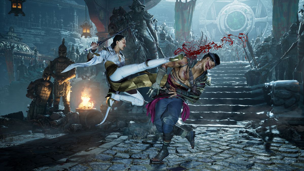 Ashrah jumps Hawk in the face in a screenshot from Mortal Kombat 1