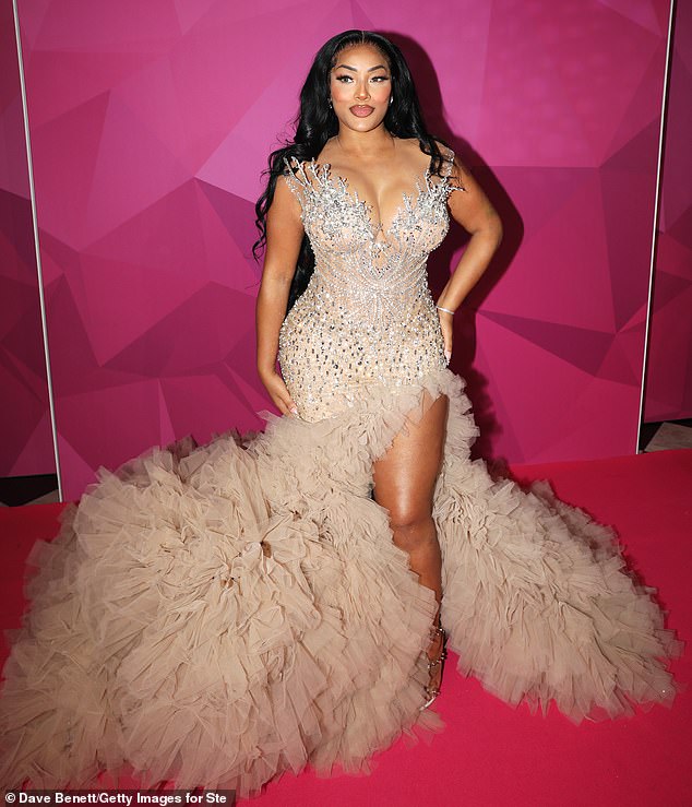 Stefflon Don made sure all eyes were on her as she arrived at the AfroRoyal 2.0 birthday party in London in a dramatic beige dazzling dress