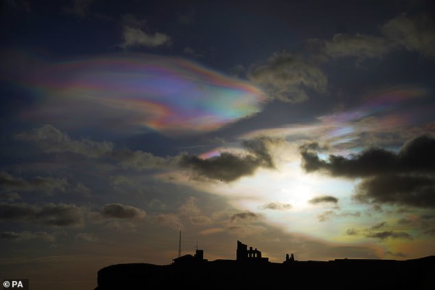 It looks like a stunning impressionist masterpiece or mother of pearl in the sky.  Although pearly clouds are usually a rare sight in the UK, they have been spotted across Britain this week, including over Tynemouth Priory (pictured).