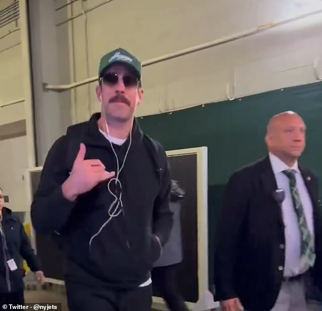 Aaron Rodgers was seen with something of a pep in his step before a game on Sunday