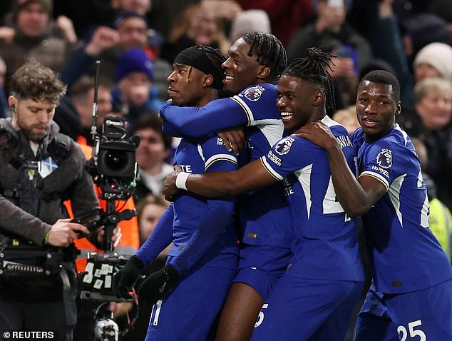 Noni Madueke celebrates his winner with Axel Disasi, Romeo Lavia and Moises Caicedo