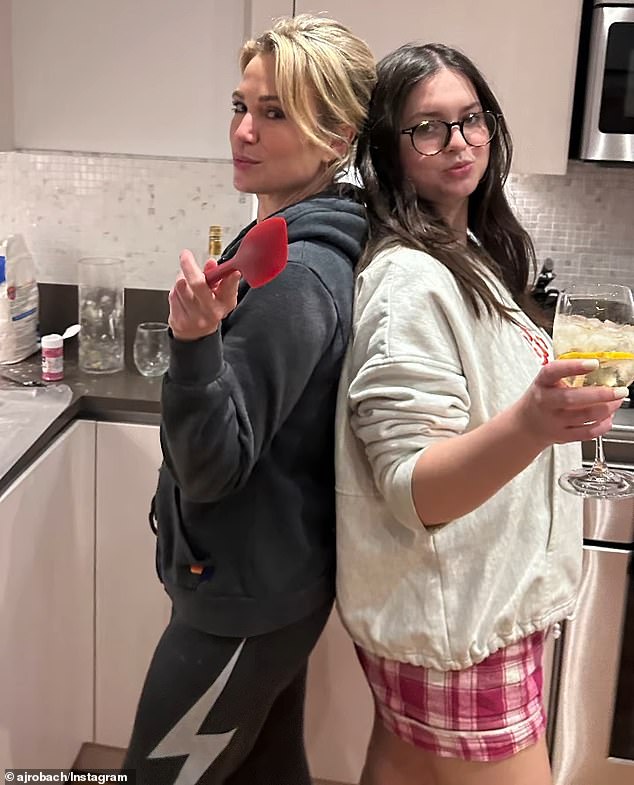 Amy Robach, 50, celebrated the holiday with her teenage daughters – pictured here in her kitchen with her youngest daughter Annalize, 16