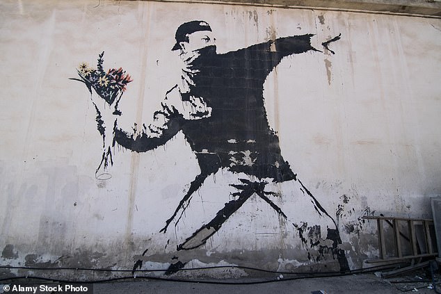 The real deal: Banksy's The Flower Thrower in the West Bank