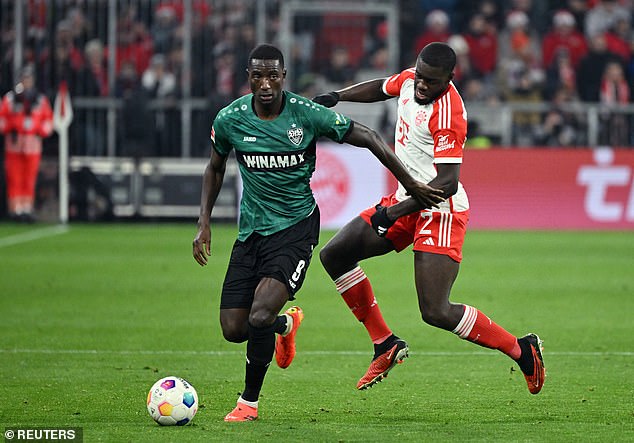 Manchester United sent scouts to watch Stuttgart striker Serhou Guirassy (left) lose 3-0 to Bayern Munich in the Bundesliga on Sunday evening