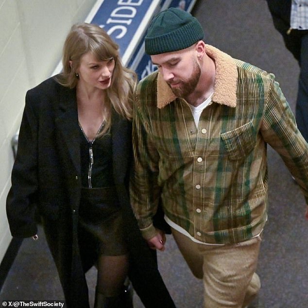 Swift looks fondly at her boyfriend Kelce as they leave Arrowhead together after the game