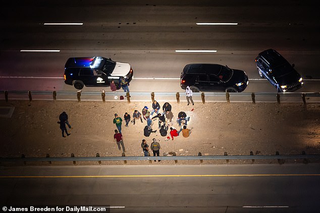 Texas Department of Public Safety officials stop a car suspected of transporting illegal immigrants in El Paso, Texas, in October