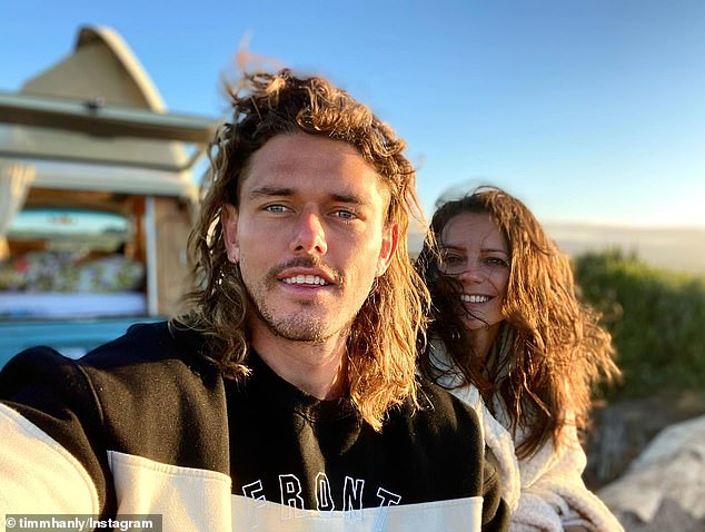 Timm Hanly has given fans an intimate glimpse into his life as a new dad with a hilarious photo of his three-month-old daughter Harper.  Pictured with fiancé Briana De La Motte