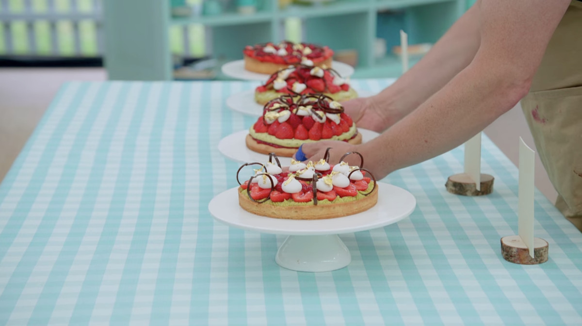 People put down their cakes during a technical challenge on an episode of Great British Baking Show