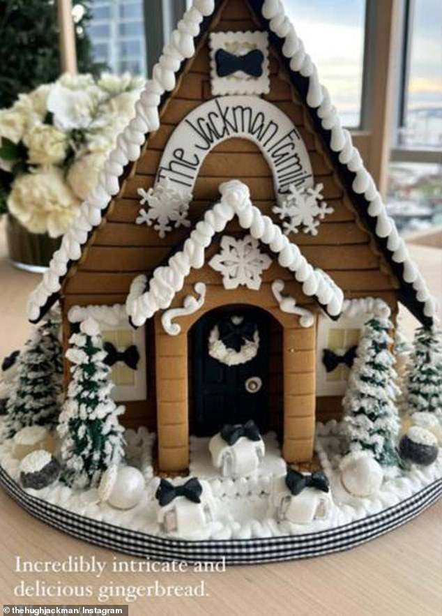 The gingerbread house was different from previous years because not all family members had names.  It contained three presents covered in snow and simply read 'The Jackman Family'.