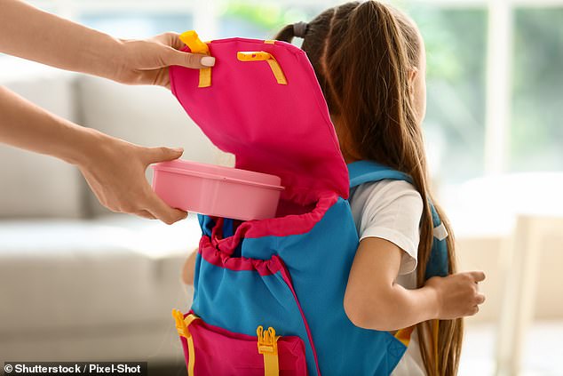 A furious mother has admitted to supplementing her daughter's lunch with laxatives in a desperate bid to stop a school bully from stealing her food