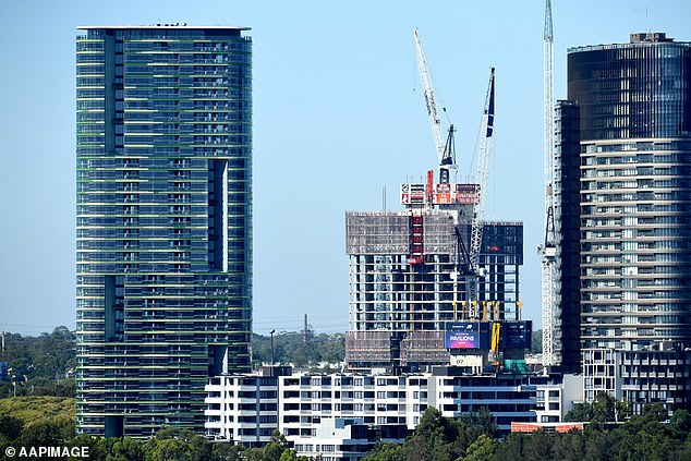 Property investors are at greater risk of losing money if they buy a high-rise property in certain parts of Australia's most populous cities (pictured is Sydney Olympic Park near Parramatta)