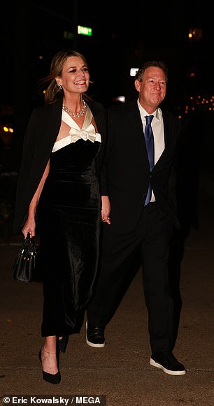 Guthrie appeared to be smiling from ear to ear alongside her husband, PR and communications consultant Michael Feldman