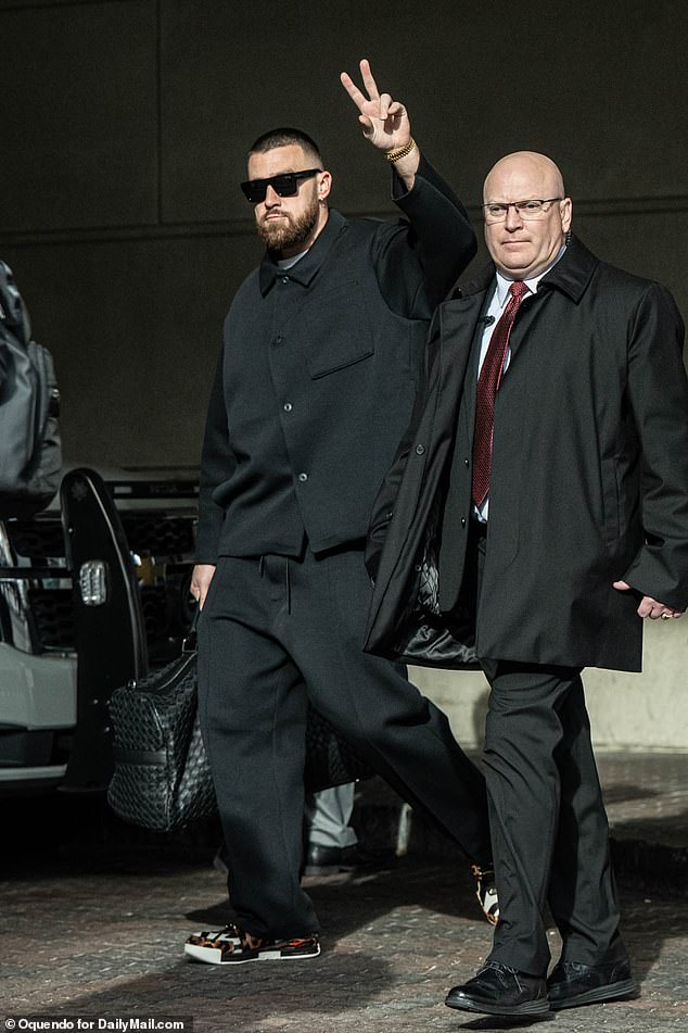 Travis Kelce was seen greeting the gathered fans outside the Kansas City Chiefs hotel