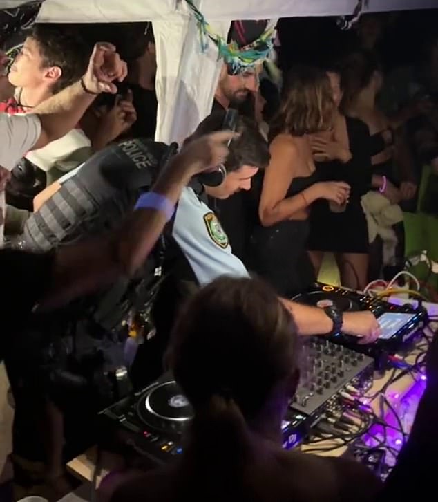 The police officer showed off his DJ skills to delighted partygoers at a rave on Sydney's northern beaches