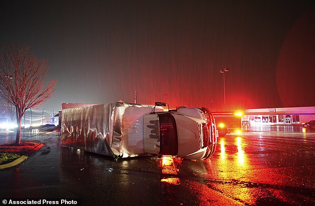 A semi-trailer is destroyed by a tornado on West Main Street in Hendersonville, Tennessee