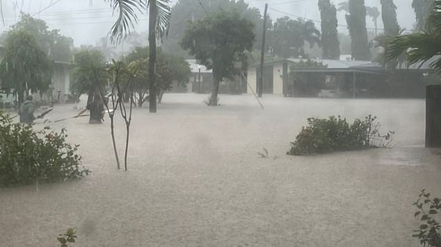 Two men were left without supplies on the roof of their remote ranger station near Battlecamp Rd in Melsonby Homestead on Saturday due to rising waters.  (Image: Residential flooding in far north Queensland)