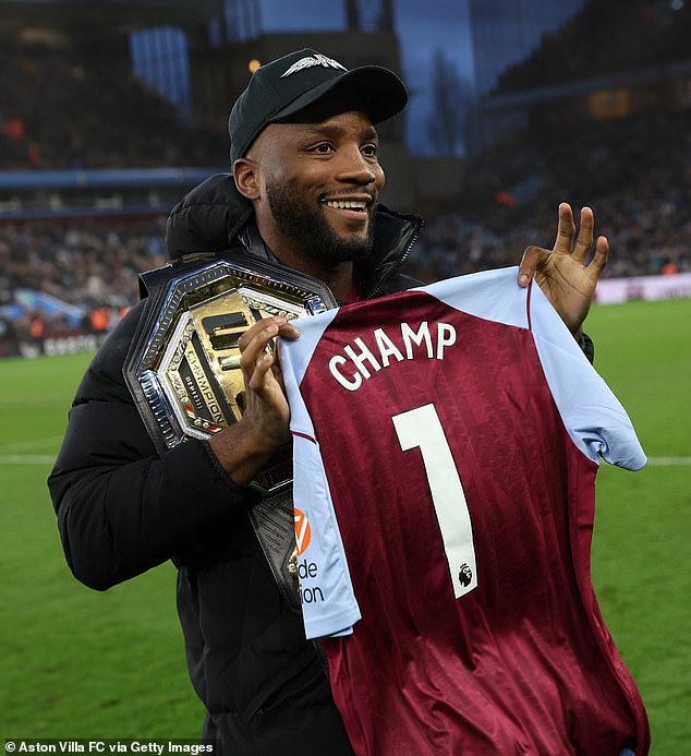 Leon Edwards was presented with a home shirt with 'Champ 1' on the back