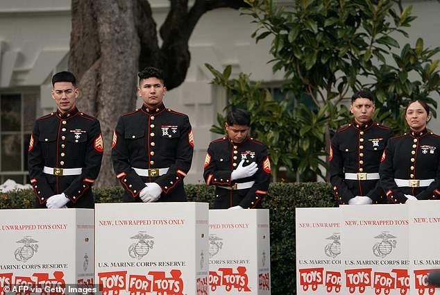 Marines in the South Portico of the White House in Washington, DC, on December 6, 2023