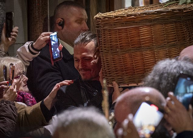 A funeral director has revealed Johnny Depp carried Shane MacGowan's coffin despite the reluctance of security officers