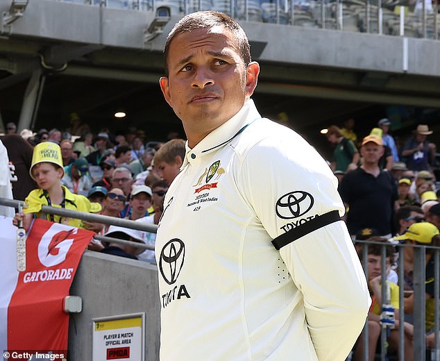 Usman Khawaja could face a penalty from the ICC over the black armband he wore during the first Test in Perth (pictured)