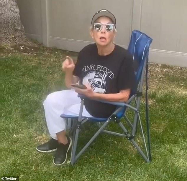 A video of Kathryn Smith, 67, harassing her neighbors - an interracial family - with racial slurs and profanity has gone viral