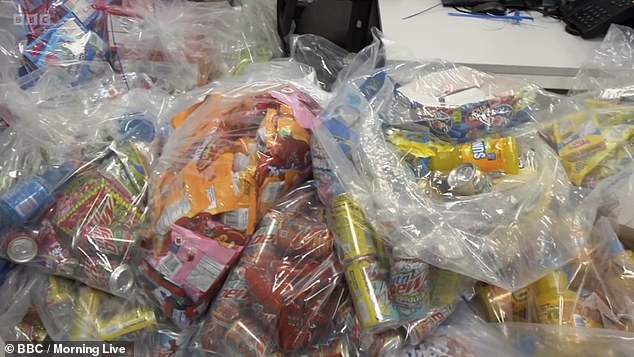 Trade standards officers seized thousands of popular American candies and soft drinks.  Pictured above are Mountain Dew, Twizzlers, Jolly Ranchers, Sunny D and Swedish Fish seized by officials