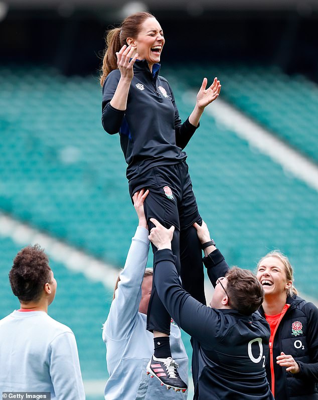 The height of entertainment - when Kate was lifted for a line-out drill during England rugby training at Twickenham last year