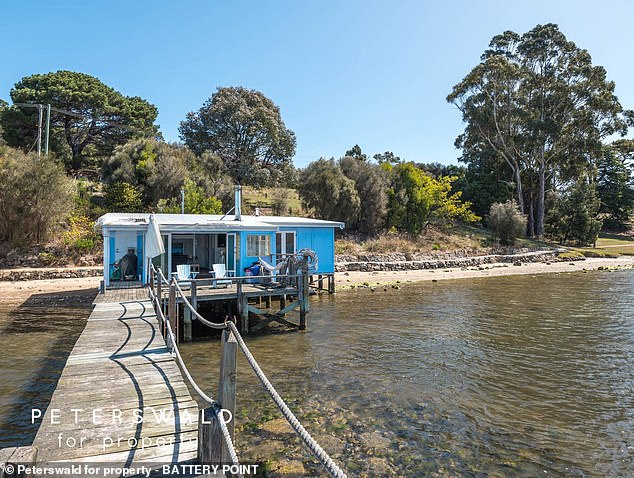 A quaint blue cabin located on the waterfront of Cornelian Bay in New Town, just north of Hobart city center, caused a buyer's frenzy