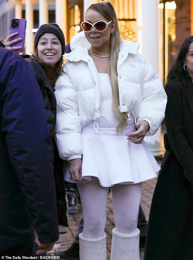 Mariah Carey brought her stage extravaganza to the sidewalk during her latest annual Christmas trip to Aspen