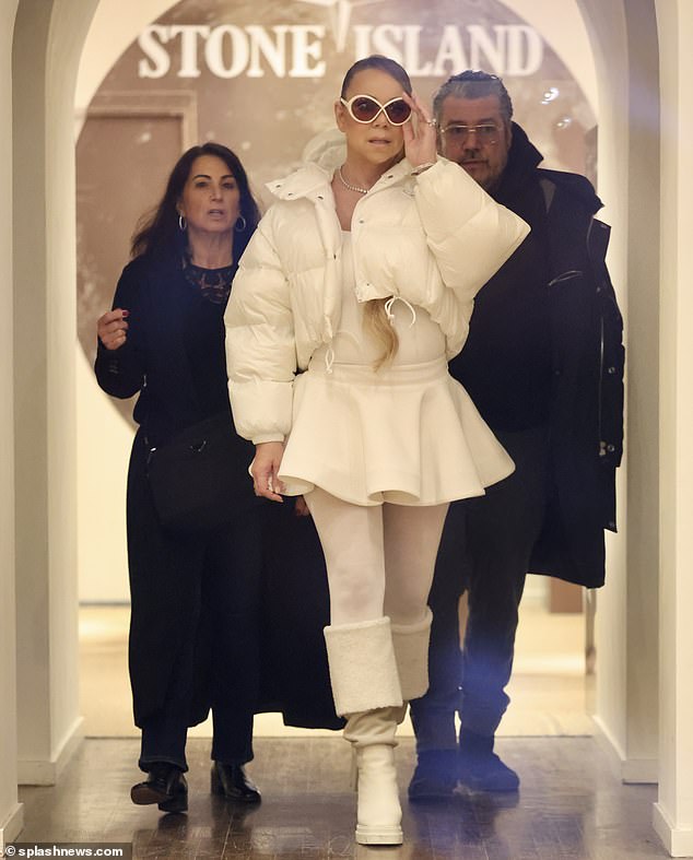 In her latest sighting, she paired her tutu pastiche with leggings and a turned-up set of fleece-lined boots, fending off the chill in a padded anorak.