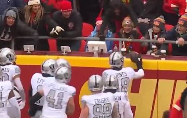 Jones took the ball away when a fan reached over the top of the child and tried to grab the ball