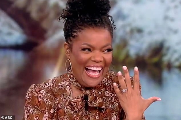 She raised her hand to show off her ring on The View