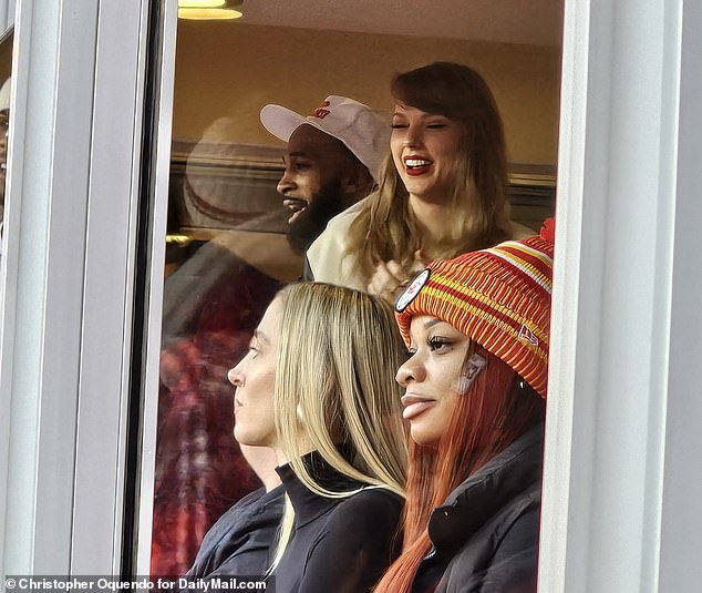 Taylor had a lot to smile about on Sunday - the Chiefs won the game and she's ringing in the new year at a party at Travis' mansion