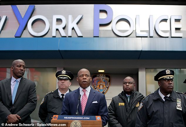 New York Mayor Eric Adams speaks during a New Year's Eve safety briefing in Times Square on Friday