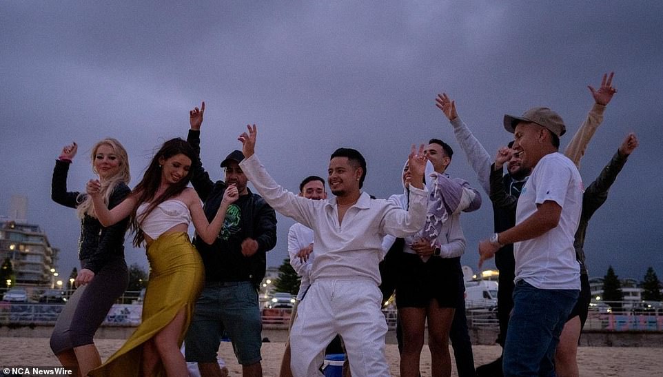 A group continued the celebrations and danced on Bondi Beach on Monday morning