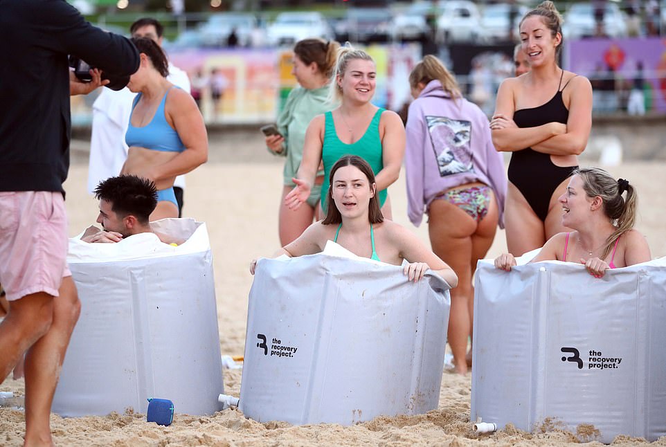 Others were seen enjoying an ice bath while lying on the sands of Bondi Beach