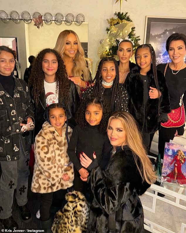 Another portrait showed Kris with daughters Khloe and Kim Kardashian as they posed backstage with their daughters and singer Mariah Carey