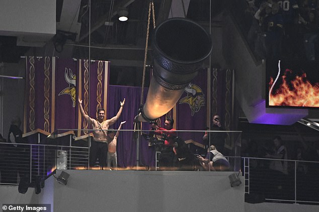 Cousins, 35, showed off his tonal body in front of a Gjallarhorn before kickoff in Minneapolis