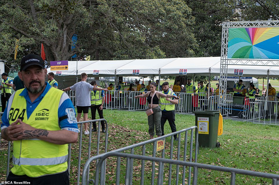 Security officers were seen searching men and women outside the festival before allowing them inside