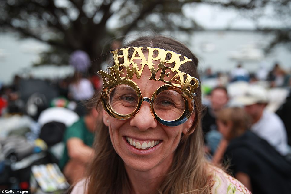 This woman decided to wear large Happy New Year glasses in Sydney