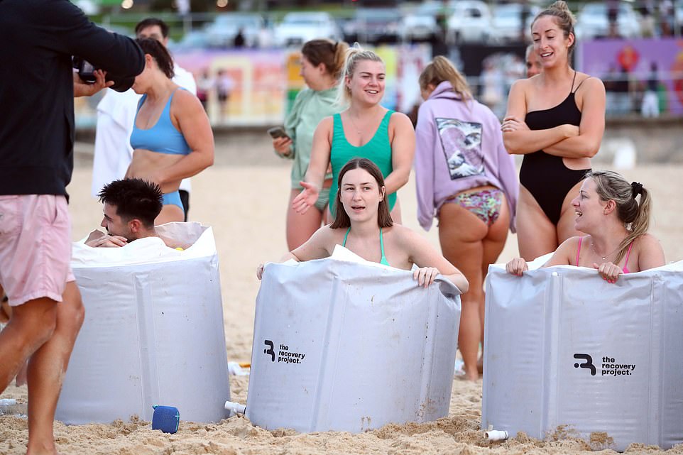 Others were seen soaking in ice baths as they sat on the sands of Bondi Beach